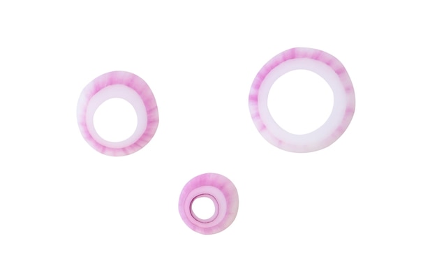 Top view set of red or purple onion slices or onion rings scattered isolated on white background