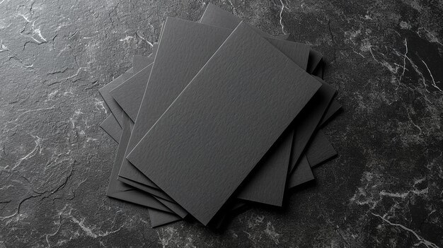 Top view of several black business cards on a gray surface with a copy space Generative AI