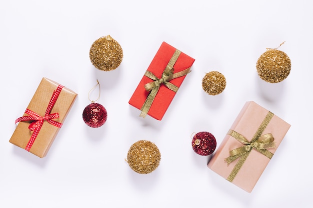 Top view of several gift boxes in wrapping paper with ribbon