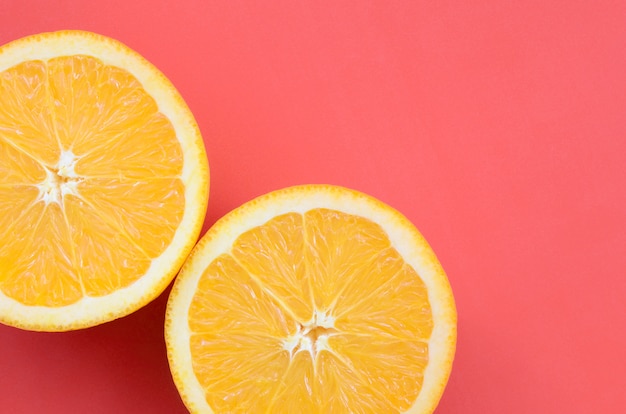 Top view of a several orange fruit slices