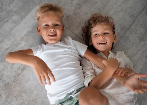 Top view siblings playing together