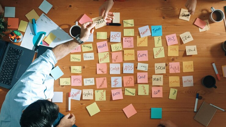 Photo top view of skilled business people discuss plan at meeting room convocation