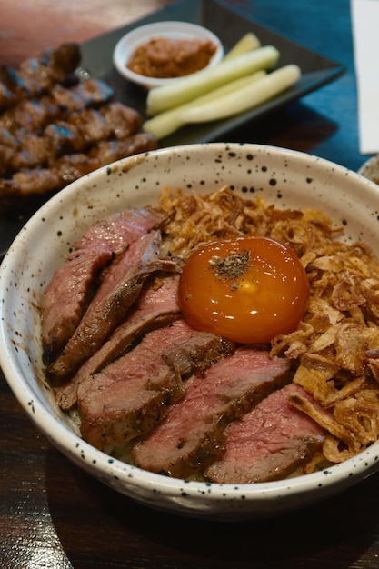 Top view of slice beef bowl rice