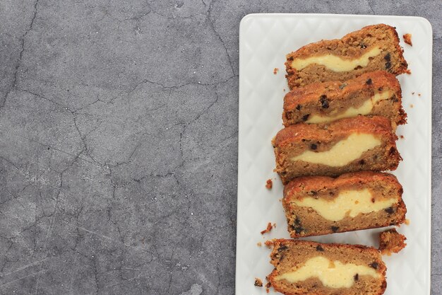 Top View Sliced Banana Bread (Banana Cake) with Cream Cheese Filling with Copy Space