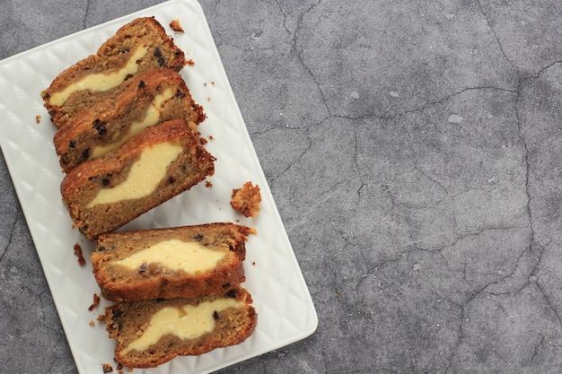 Top View Sliced Banana Bread (Banana Cake) with Cream Cheese Filling with Copy Space