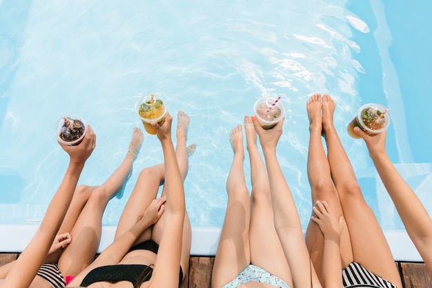 Top view smoothies above swimming pool