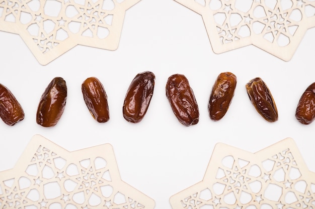 Photo top view snacks aligned on table for ramadan