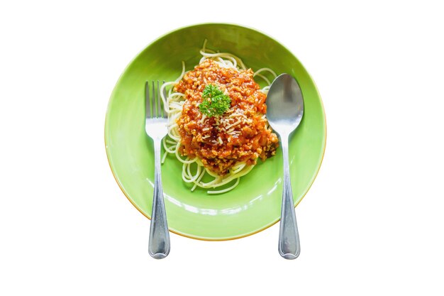 Photo top view of spaghetti tomato sauce and minced pork look tasty with spoon and fork on ceramic plate and isolate on white background make with paths