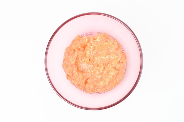 Top view of spicy fermented durian or popularly known as tempoyak in a purple bowl