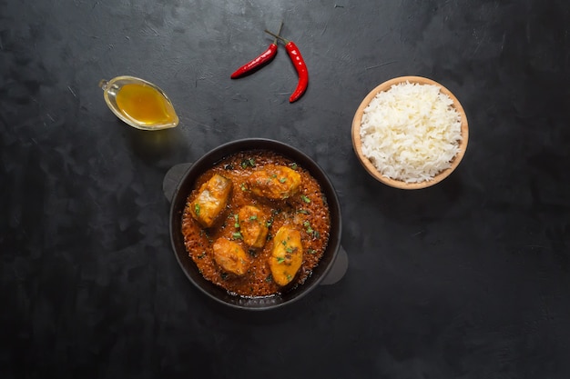 Top view of spicy and hot Bengali fish curry