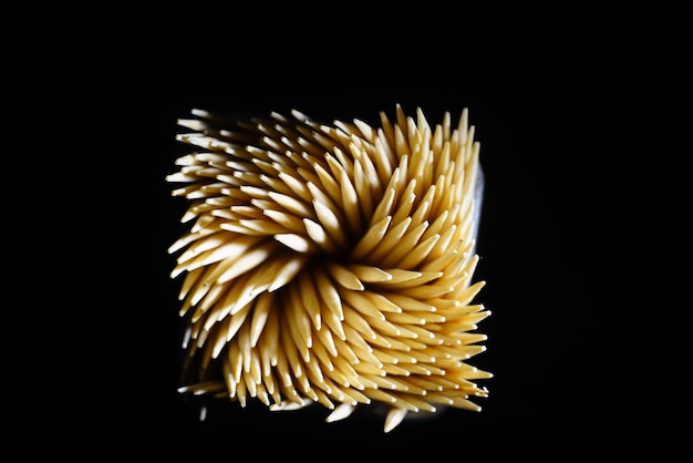 Top view of Spiral Toothpicks in black background. Macro shot of Toothpicks. Close up. Isolated