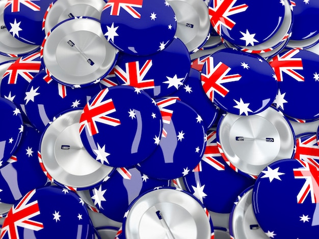 Top view of stack of button badges with flag of australia. realisitc 3d render