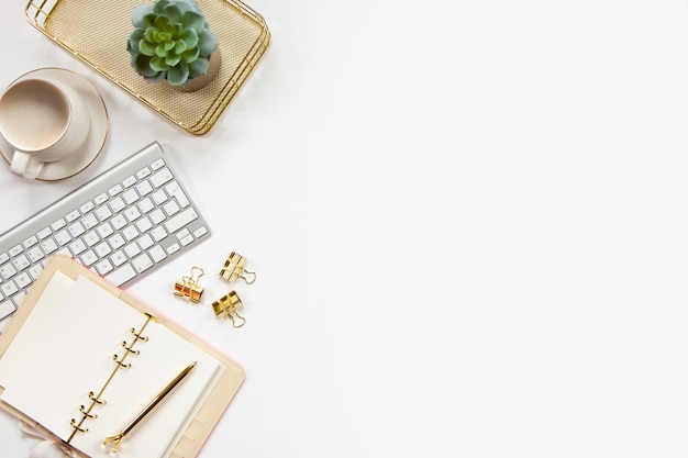 Top view of stylish office desk with plant