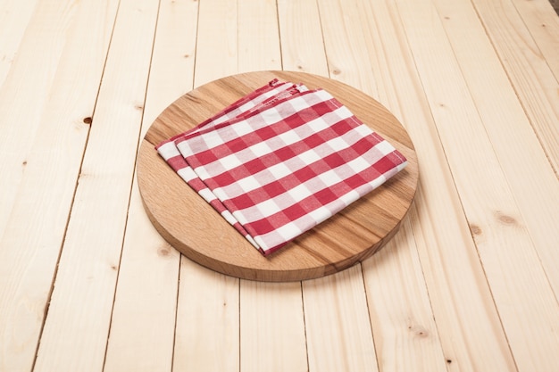 Top View of Table cloth, kitchen napkin on wooden table