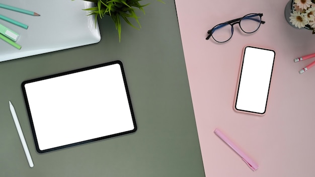 Top view of tablet, smart phone and glasses