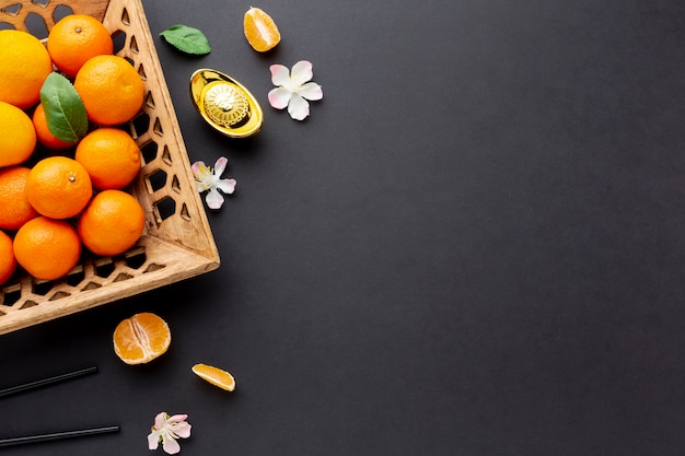 Photo top view of tangerine basket chinese new year