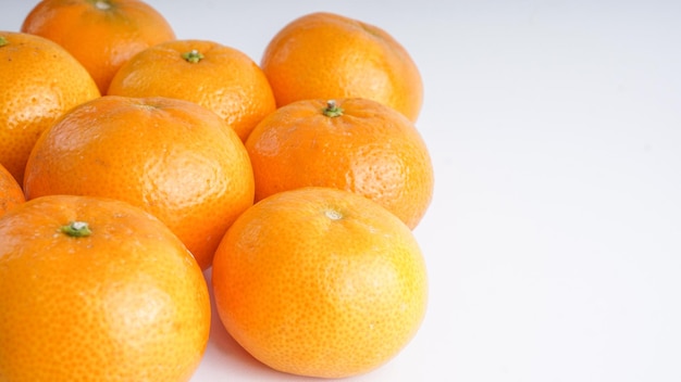 Top view of tangerines on a white background
