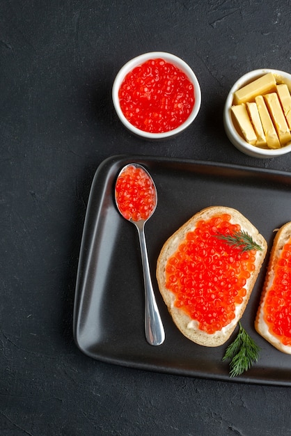 top view tasty caviar sandwiches inside plate.