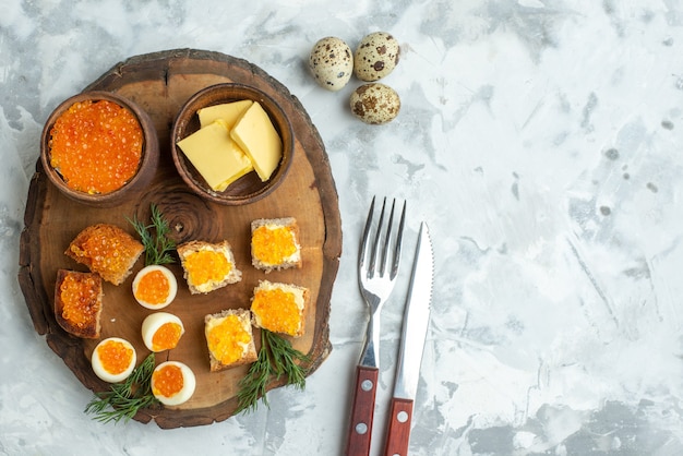 top view tasty caviar sandwiches with boiled eggs on wooden board white background breakfast food meal seafood fish lunch toasts