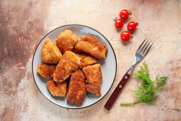 Top view tasty chicken wings inside plate on brown surface burger meal food dinner meat lunch sandwich