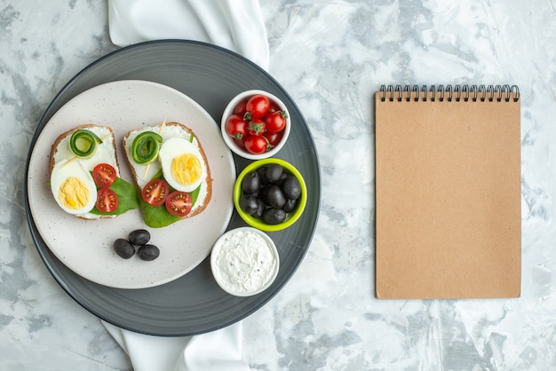 top view tasty egg sandwiches with olives on white surface sandwich diet food health meal toast lunch bread burgers