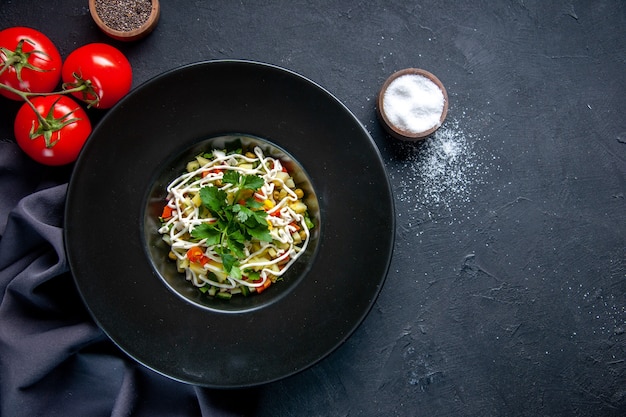 top view tasty potato salad inside plate with red tomatoes and seasonings on dark surface food meal dinner bread horizontal colour lunch