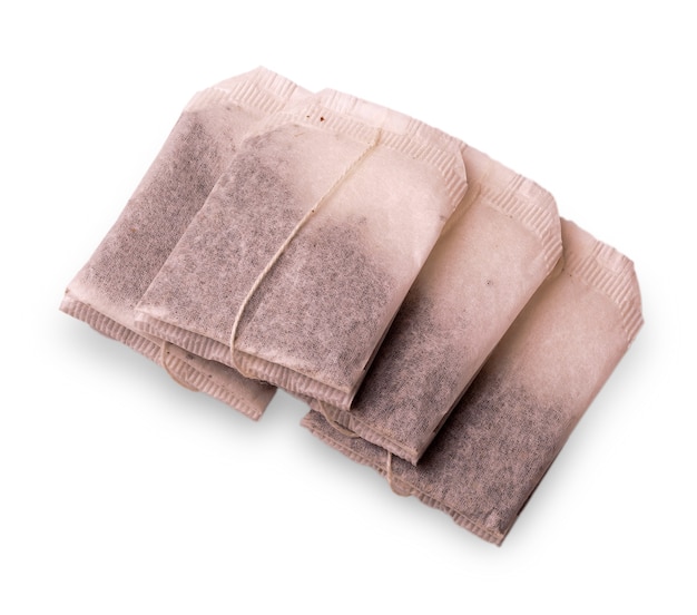 Top view of teabags isolated on white surface