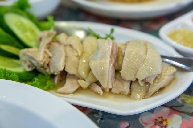 Top view of Thai food style Hainanese chicken rice or steamed chicken rice focus selective