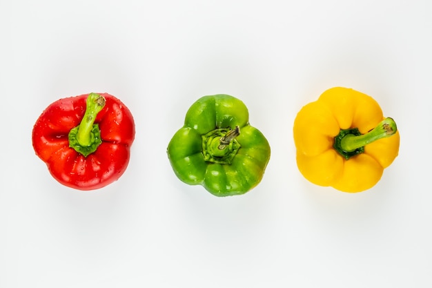 Top view of three fresh bright bell peppers