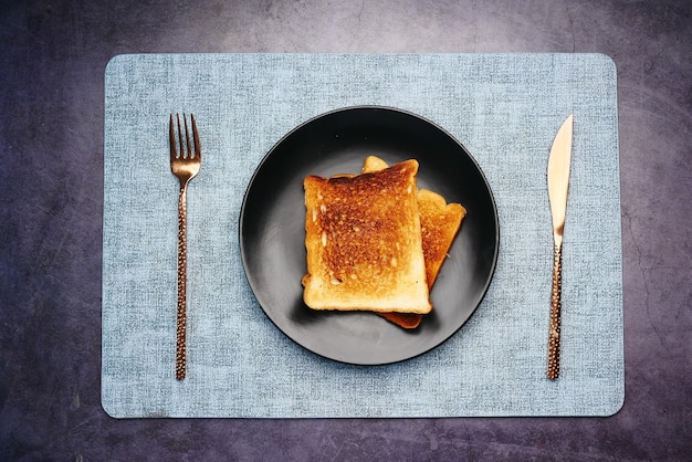 Top view of toasted baked bread on table