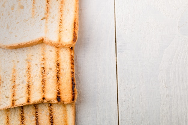 Top view of toasted grilled bread. Copy space.