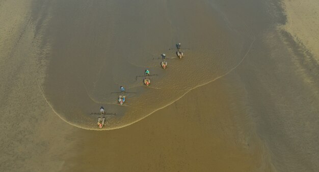 Top view of tractors working on field