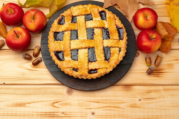 Top view of a traditional american thanksgiving pie top view on wooden board