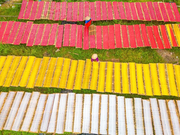 Top view of traditional village making colorful jelly food they was drying fresh jelly on a wooden grid for the market lifestyle concept