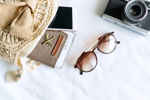 Top view of travel items of a traveler woman