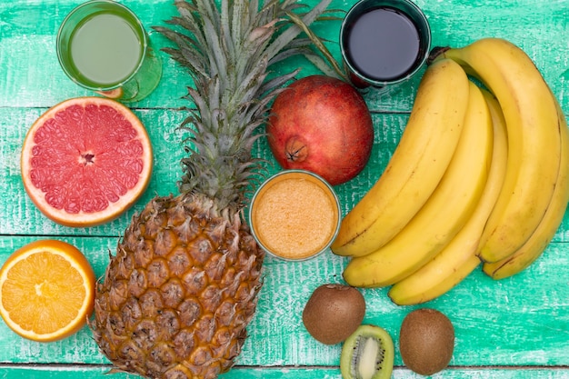 Top view tropical fruits on wooden table