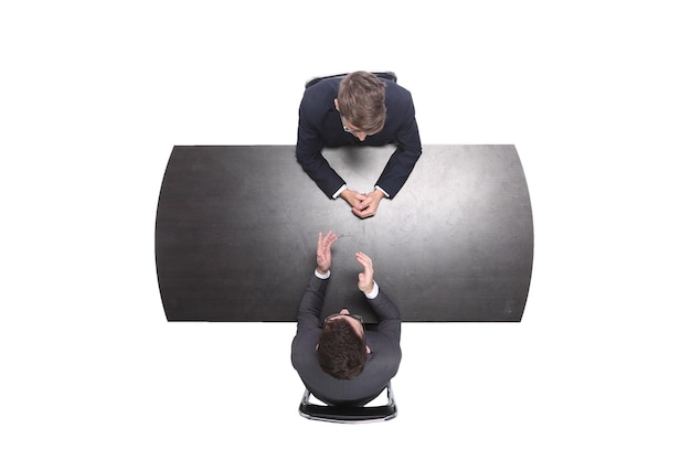 Top view two business people discussing something at a meeting