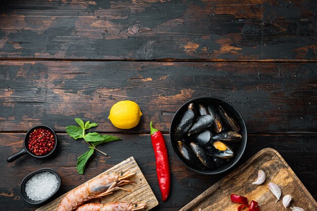 Top view on typical seafood paella ingredients