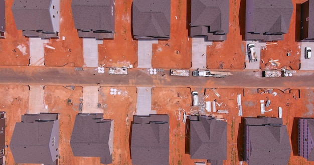 Top view of an unfinished subdivision construction site for an incomplete neighborhood