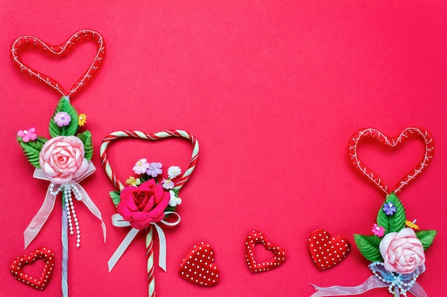 Top view valentines day background and decorations.love shape  bouquet gift  on red background with copy space.