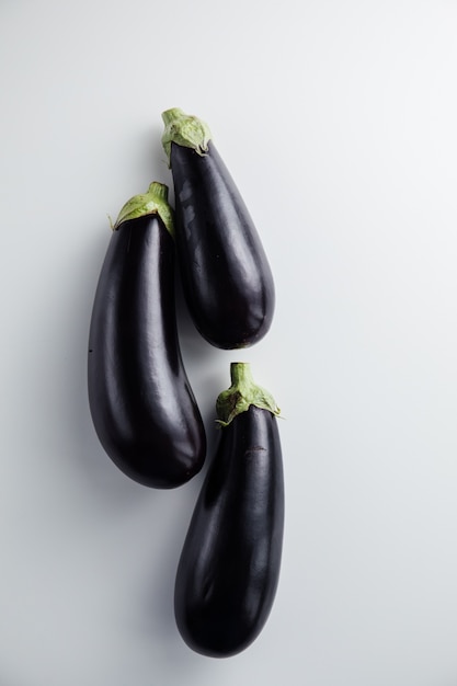 Top view on various eggplants isolated
