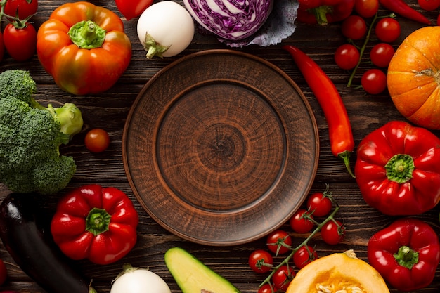 Top view vegetables and plate arrangement