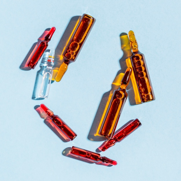 Top view vials on blue background