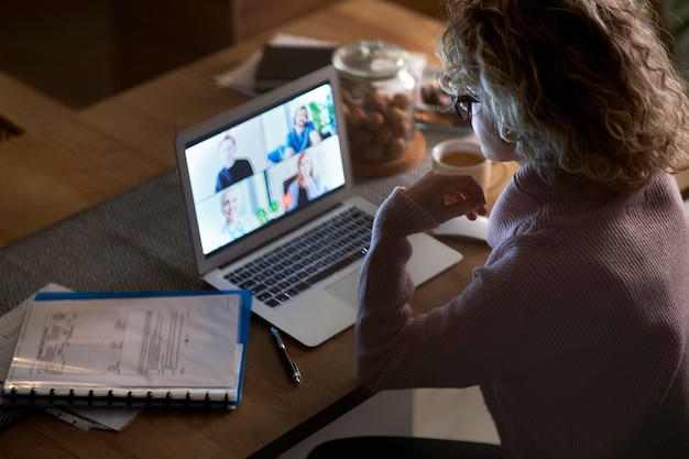 Top view of video conference to late at home