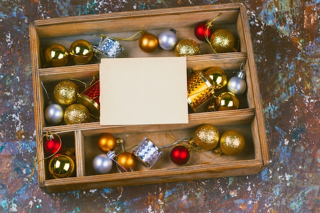 Top view vintage christmas box with decorations