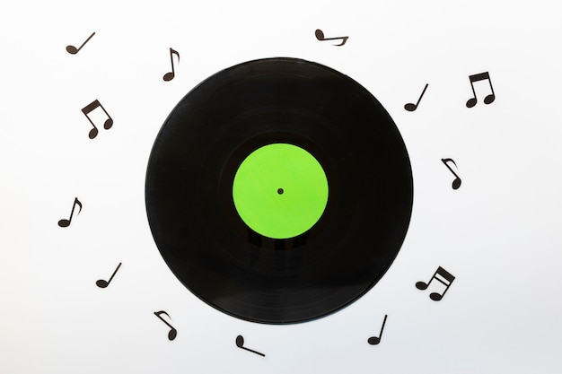 Top view vinyl disc with musical notes