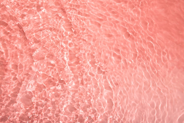 Photo top view water texture on pink