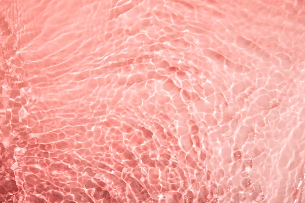 Photo top view water texture on pink