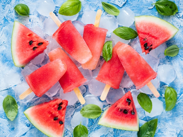 Top view of watermelon and basil popsicles