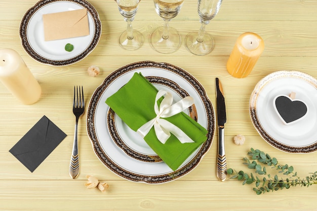 Top view of a wedding table setting with decorations